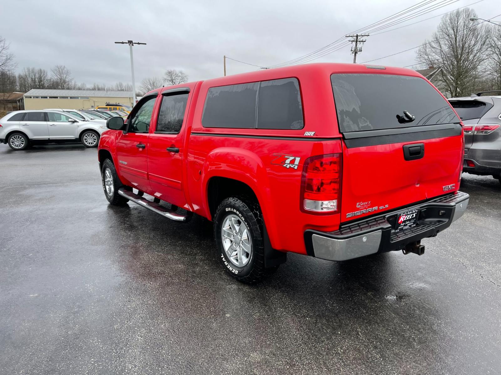 2012 Red /Black GMC Sierra 1500 SLE Crew Cab 4WD (3GTP2VE78CG) with an 5.3L V8 OHV 16V FFV engine, 6-Speed Automatic transmission, located at 11115 Chardon Rd. , Chardon, OH, 44024, (440) 214-9705, 41.580246, -81.241943 - Photo #9